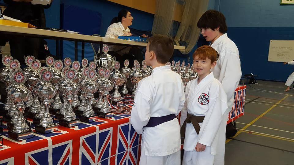 Karate trophy table and competitors